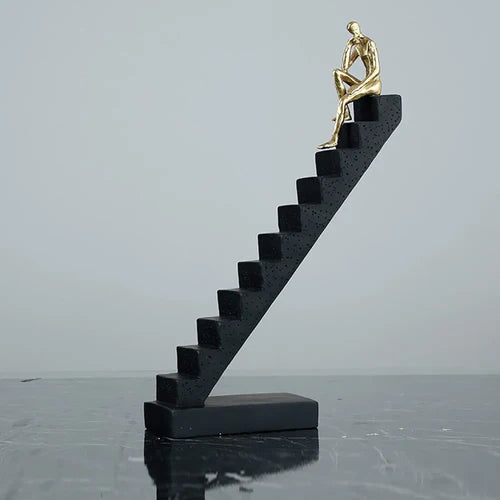 Resin Man Sitting On Stairs Statue