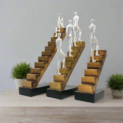 Resin Man On Stairs Statue