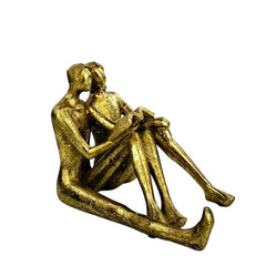 Golden Couple Reading Book Sculpture